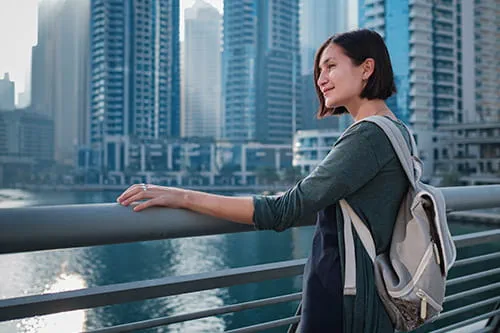 happy-young-female-traveler-big-city happy-young-female-traveler-big-city