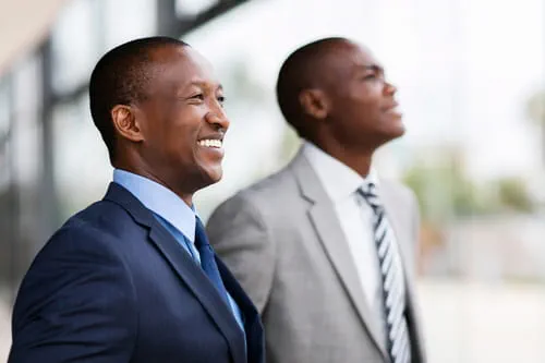 Two businessmen smiling Two businessmen smiling