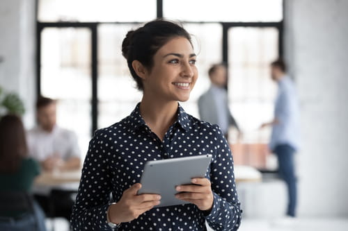 businesswoman holding a tablet