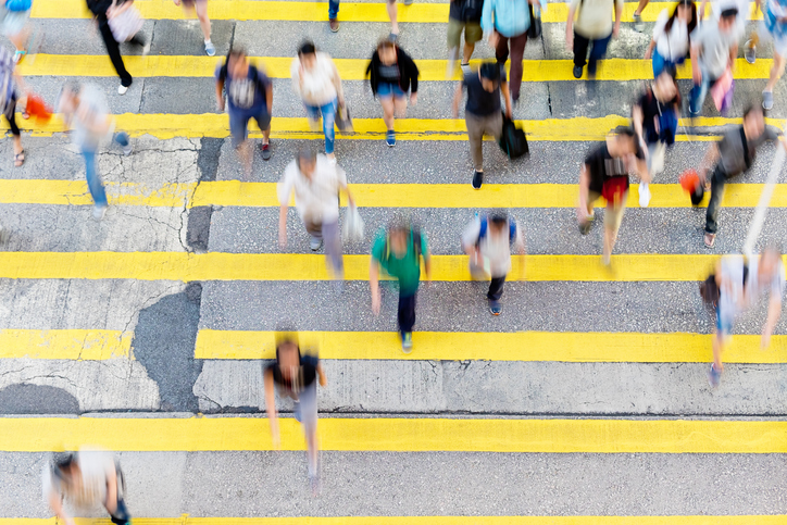 aerial view people crossing busy street