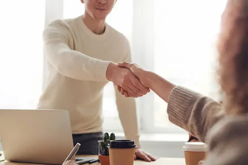 Two colleagues shaking hands Two colleagues shaking hands