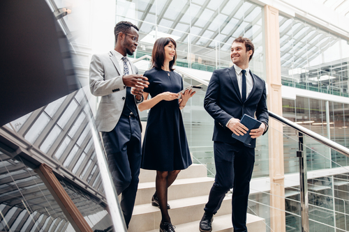 three businesspeople talking three businesspeople talking