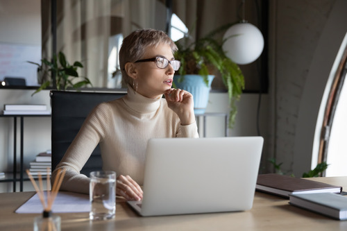 woman in front of a laptop woman in front of a laptop