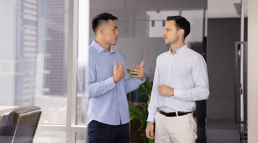  Two diverse business professional men