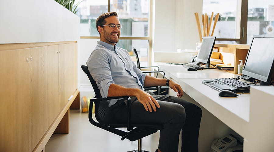 Successful businessman in office