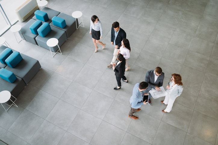 aerial view people talking in lobby setting