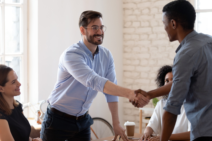 two men shaking hands