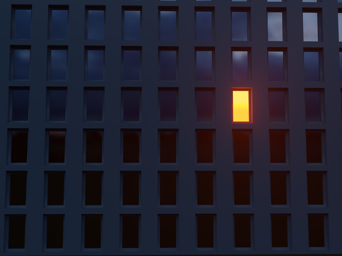 one window lit in dark building