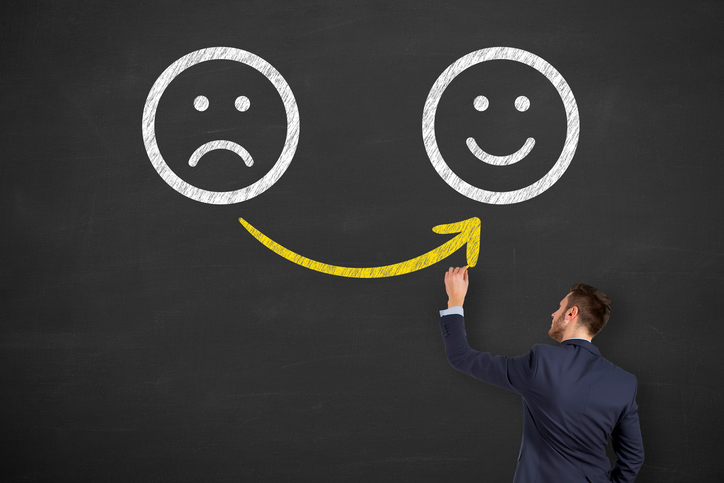 frowning face to smiling face conveying moving from dissatisfaction to satisfaction
