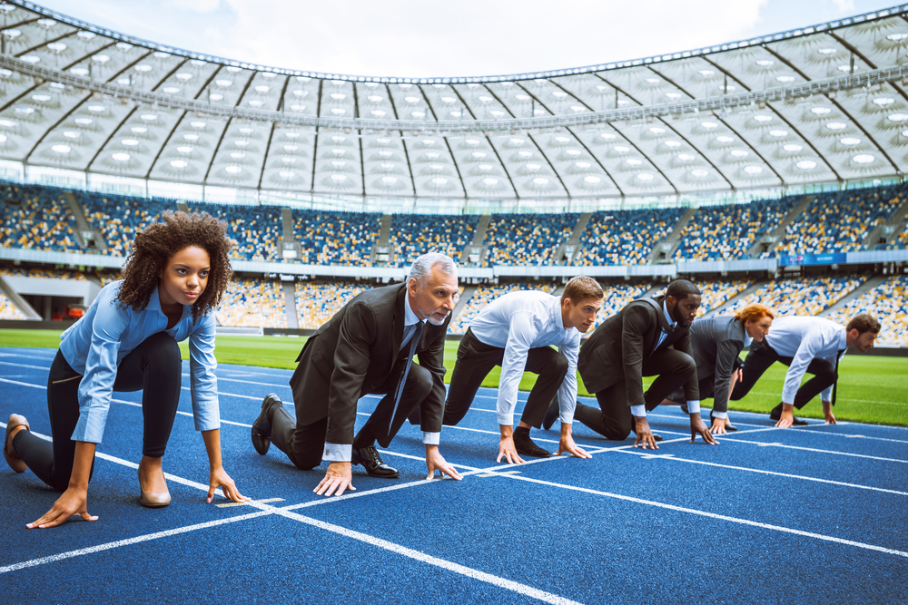 business people at the starting line of a race