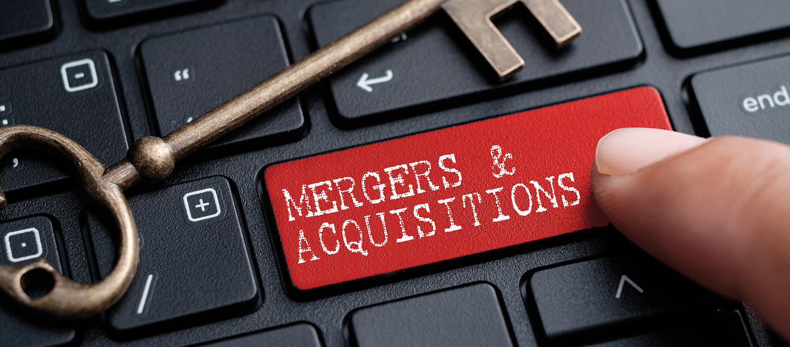 Photo showing a button with mergers and acquisitions written on it