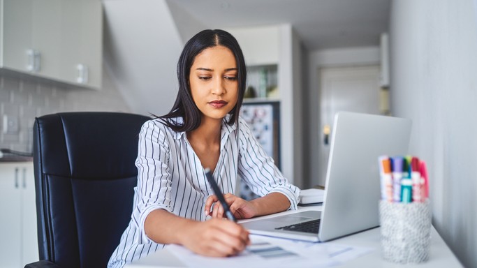 Picture or business woman working on her desk