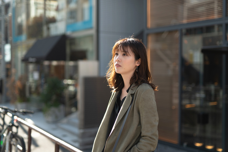 woman contemplating decision about outplacement