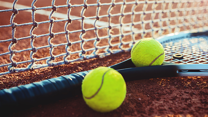 tennis racquet and tennis balls