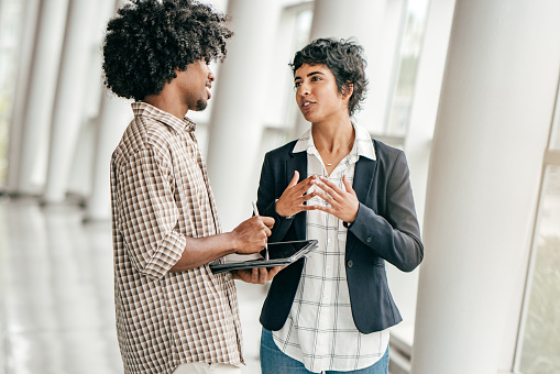 two colleagues talking