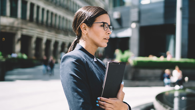 woman holding laptop